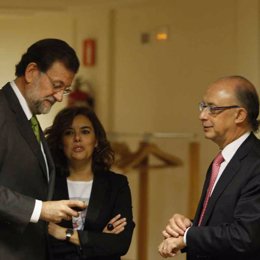 Presidente del PP, Mariano Rajoy, con la portavoz del PP en el Congreso, Soraya 