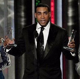 Image #: 17720653    Latin singer Don Omar holds two of his awards at the 2012 B