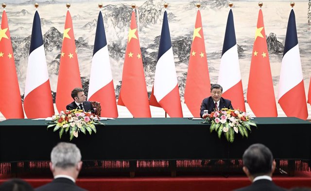 El presidente de Francia, Emmanuel Macron, junto a su homólogo chino, Xi Jinping
