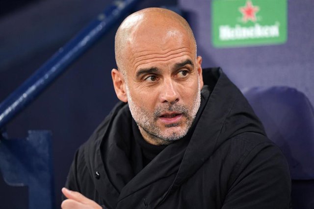 11 April 2023, United Kingdom, Manchester: Manchester City manager Pep Guardiola reacts ahead of the the UEFA Champions League quarter final first leg soccer match between Manchester City and Bayern Munich at Etihad Stadium. Photo: Tim Goode/PA Wire/dpa