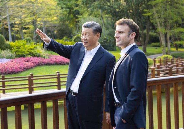 El presidente de China, Xi Jinping, junto a su homólogo de Francia, Emmanuel Macron