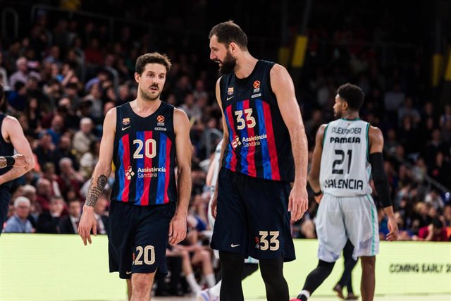 Nico Laprovittola and Nikola Mirotic of FC Barcelona during the Turkish Airlines EuroLeague match between FC Barcelona and Valencia Basket  at Palau Blaugrana on April 14, 2023 in Barcelona, Spain.