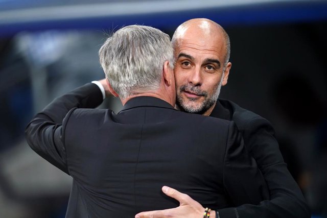 L'entrenador del Manchester City, Pep Guardiola, amb el del Reial Madrid, Carlo Ancelotti