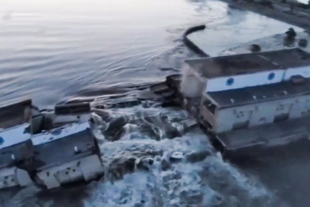 HANDOUT - 06 June 2023, Ukraine, Kherson: A screen grab from a video made available by Ukraine's Presidential Office, shows the damaged Nova Kakhovka dam near Kherson. 