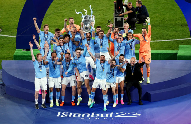 10 June 2023, Turkey, Istanbul: Manchester City's Ilkay Gundogan lifts the UEFA Champions League Trophy following victory over Inter Milan in the UEFA Champions League Final soccer match at the Ataturk Olympic Stadium. Photo: Mike Egerton/PA Wire/dpa