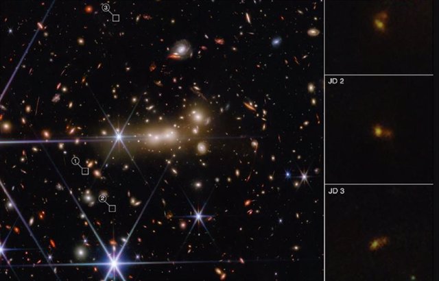 La enorme gravedad del cúmulo de galaxias MACS0647 actúa como una lente cósmica para doblar y magnificar la luz del sistema MACS0647-JD, más distante.