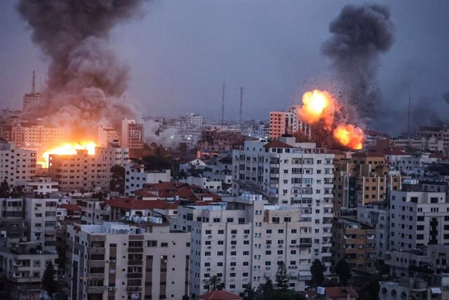 October 9, 2023, Gaza, Palestine: Flames and smoke billow during Israeli strikes in Gaza. Israel imposed a total siege on the Gaza Strip on October 9 and cut off the water supply as it kept bombing targets in the crowded Palestinian enclave in response to
