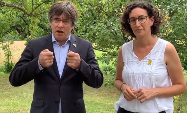 Archivo - L'expresident de la Generalitat Carles Puigdemont i la secretària general d'ERC, Marta Rovira