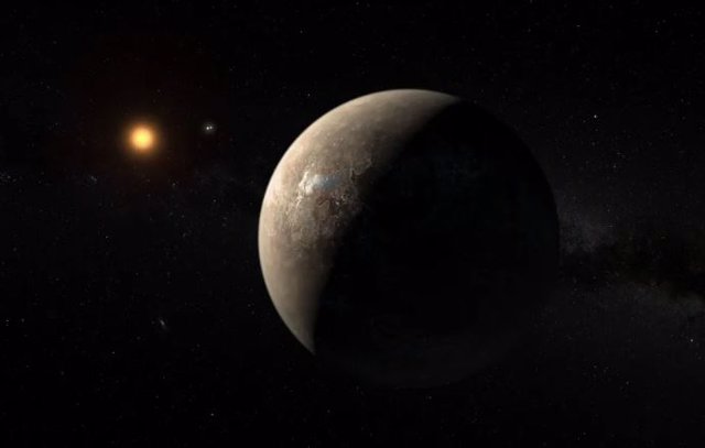 Una impresión artística muestra el planeta Próxima b orbitando la estrella enana roja Próxima Centauri, la estrella más cercana al Sistema Solar.