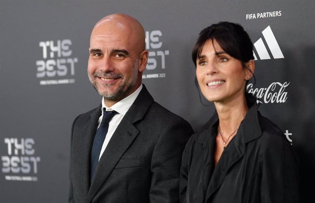 15 January 2024, United Kingdom, London: Manchester City manager Pep Guardiola speaks after receiving the award for The Best FIFA Men's Coach on stage during The Best FIFA Football Awards at the Eventim Apollo. Photo: John Walton/PA Wire/dpa