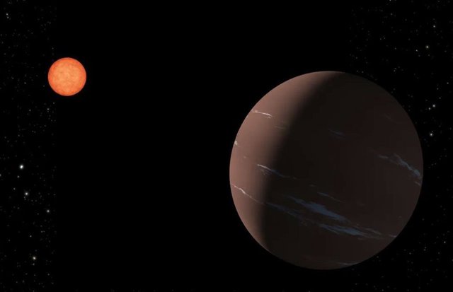 Esta ilustración muestra una forma en que el planeta TOI-715 b, una súper Tierra en la zona habitable alrededor de su estrella, podría aparecer ante un observador cercano.