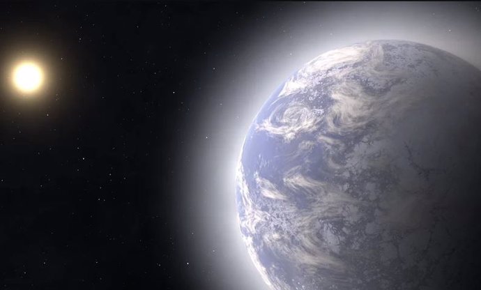 Representación artística de un exoplaneta cuyo hielo de agua en la superficie se vaporiza cada vez más y forma una atmósfera durante su aproximación a la estrella central del sistema planetario.
